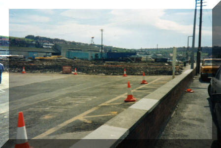GK - The wooden shops have just been demolished, Langborne Road will soon be in place with the Co-op to the right of the photo 1990